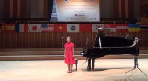 Ahe (12) at the 2nd and final round of a competition at the Vietnam Academy of Music in Hanoi, September 2015. She plays among others Variations on a Theme of Mozart by Glinka.