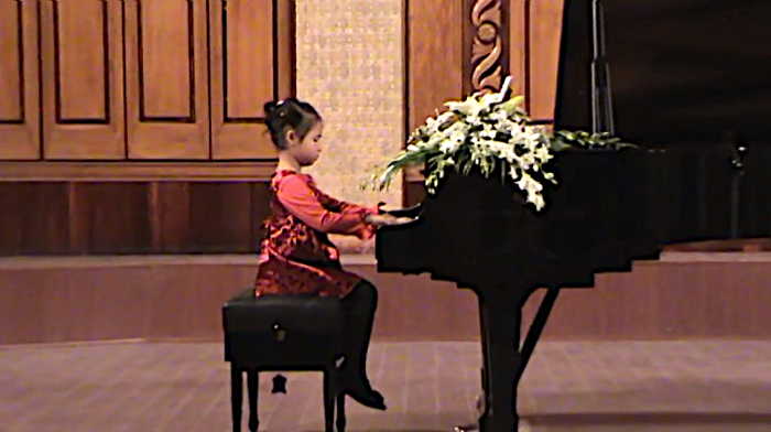Ahe (5) doing her first examination in May 2009 at the Vietnam National Academy of Music (VNAM) in Hanoi