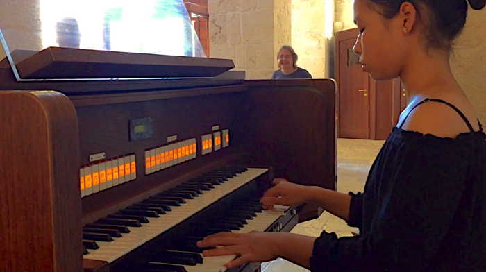 Ahe (14) playing Bach at the Church of Sant'Antionio da Padova at Alberobello, Italy in July, 2018